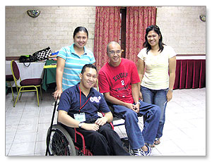 Mark and his team (Rodinna and Analyn) with Abner