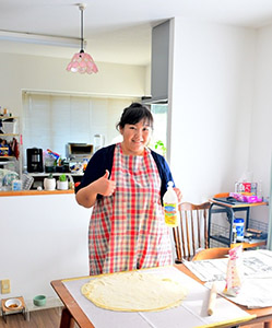 Byamba-san preparing Mongolian food during her homestay.