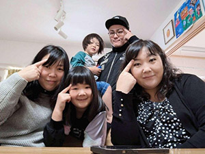 Byamba-san spending time with her host family during her homestay.