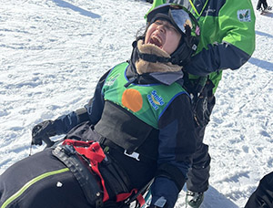 Coco-san enjoying adaptive skiing during the ski training program.