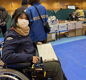 Coco-san learning about disaster preparedness during her individual training program.